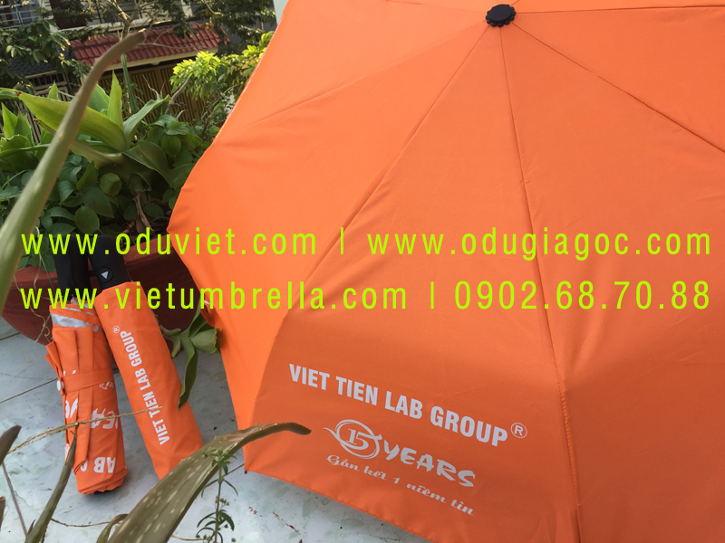 xưởng sản xuất ô dù cầm tay in logo quảng cáo